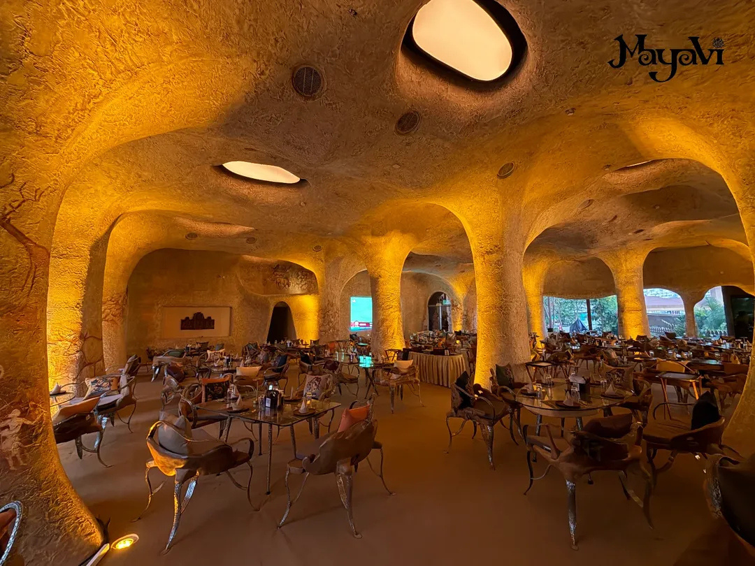 Inside Mayavi, Pune - sculpted golden interiors of the MSV 2.0 venue